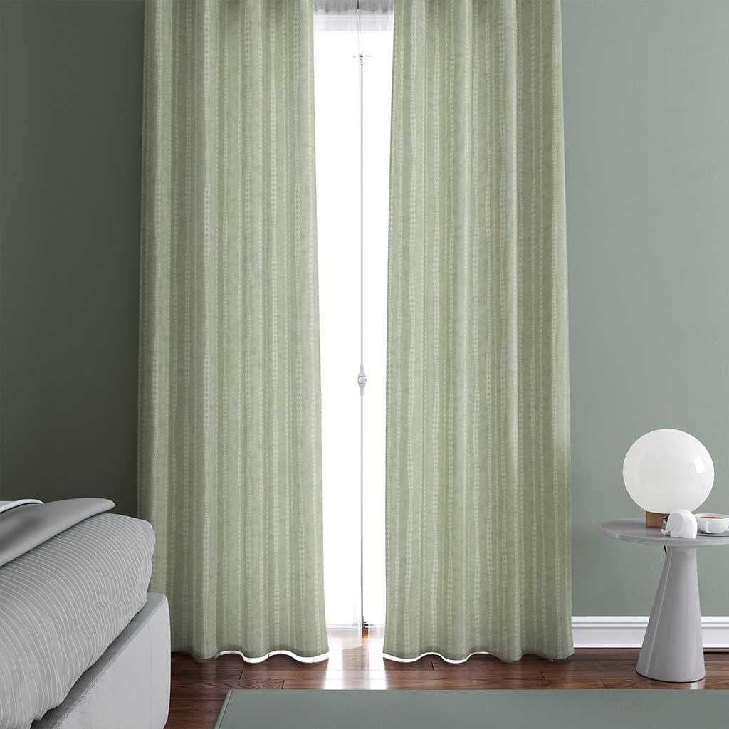 Example of a room with the irregular hand-drawn stripes on a sage green background with a slight watercolor texture curtains. 