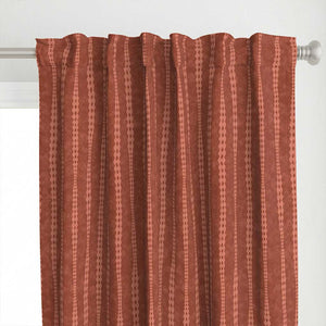 Top detail of the irregular hand-drawn stripes on a rust red background with a slight watercolor texture curtain.