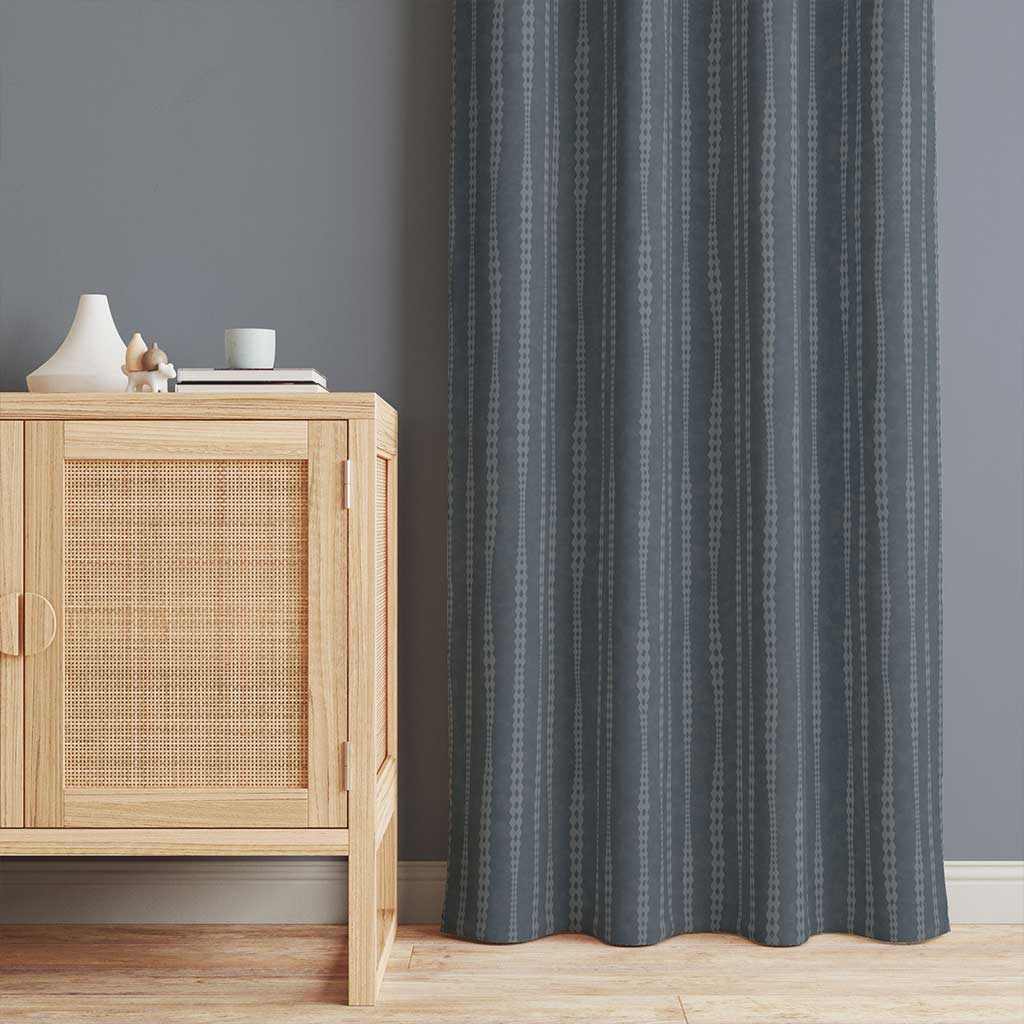 50 inch wide curtains with irregular hand-drawn stripes in gray blue on a dark steel blue background with a slight watercolor texture. Order two to complete a window-scape.