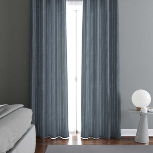 Example of a room with the irregular hand-drawn stripes in gray blue on a dark steel blue background with a slight watercolor texture curtains. 