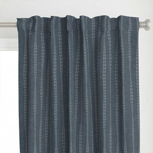 Top detail of the irregular hand-drawn stripes in gray blue on a dark steel blue background with a slight watercolor texture curtain.