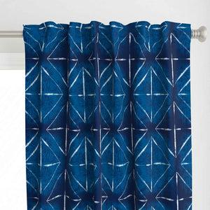 Top detail of the my indigo tie dye midnight cabana pattern curtain.