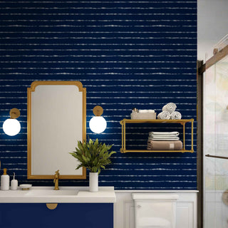 Shibori Indigo Tie Dye Horizons Larger Pattern Peel & Stick and Pre-Pasted Wallpaper in a bathroom
