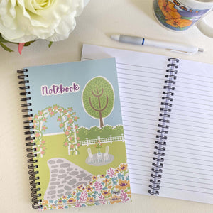 Mary's Garden Soft Cover Notebook is 5.5 x 8.5 inches and 80 College Ruled Pages.