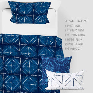 4 Piece Shibori Indigo Midnight Cabana twin bed set. One sham, one 18 inch throw pillows, one lumbar and a duvet cover.