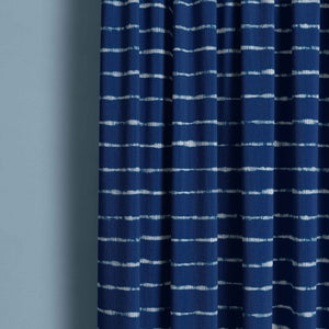 Detail of tie dye pattern indigo curtain.