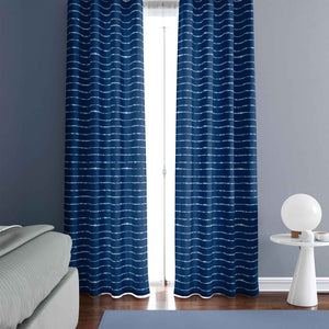 Example of a room with a view of the full length of the curtains.