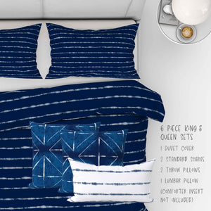 6 Piece Shibori Indigo Horizons in Blue bedding set. Set includes two shams, duvet, two 18 inch throw pillows and one lumbar pillow. Available in twin, full, queen, king and cal. king.