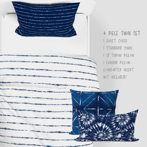 Shibori Indigo Tie Dye White Horizons bedding set. Available in full, queen, king and cal. king sizes. 4 Piece set includes one sham, duvet cover, one 18inch throw pillow and one lumbar pillow.