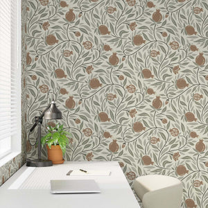 Detail of the Woodcut Pomegranate fruit in Mocha and Sage is a subtle pattern for any space - shown here in a desk nook