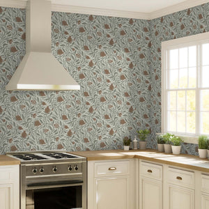 Woodcut Pomegranate fruit in Mocha and Sage is a subtle pattern for any space - shown here in a kitchen