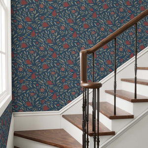 Deep Red woodcut pomegranate fruit on navy backdrop - striking solution on a stairway