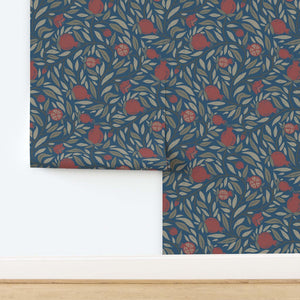 Roll of wallpaper with a floral pattern shows the sizing of the pattern