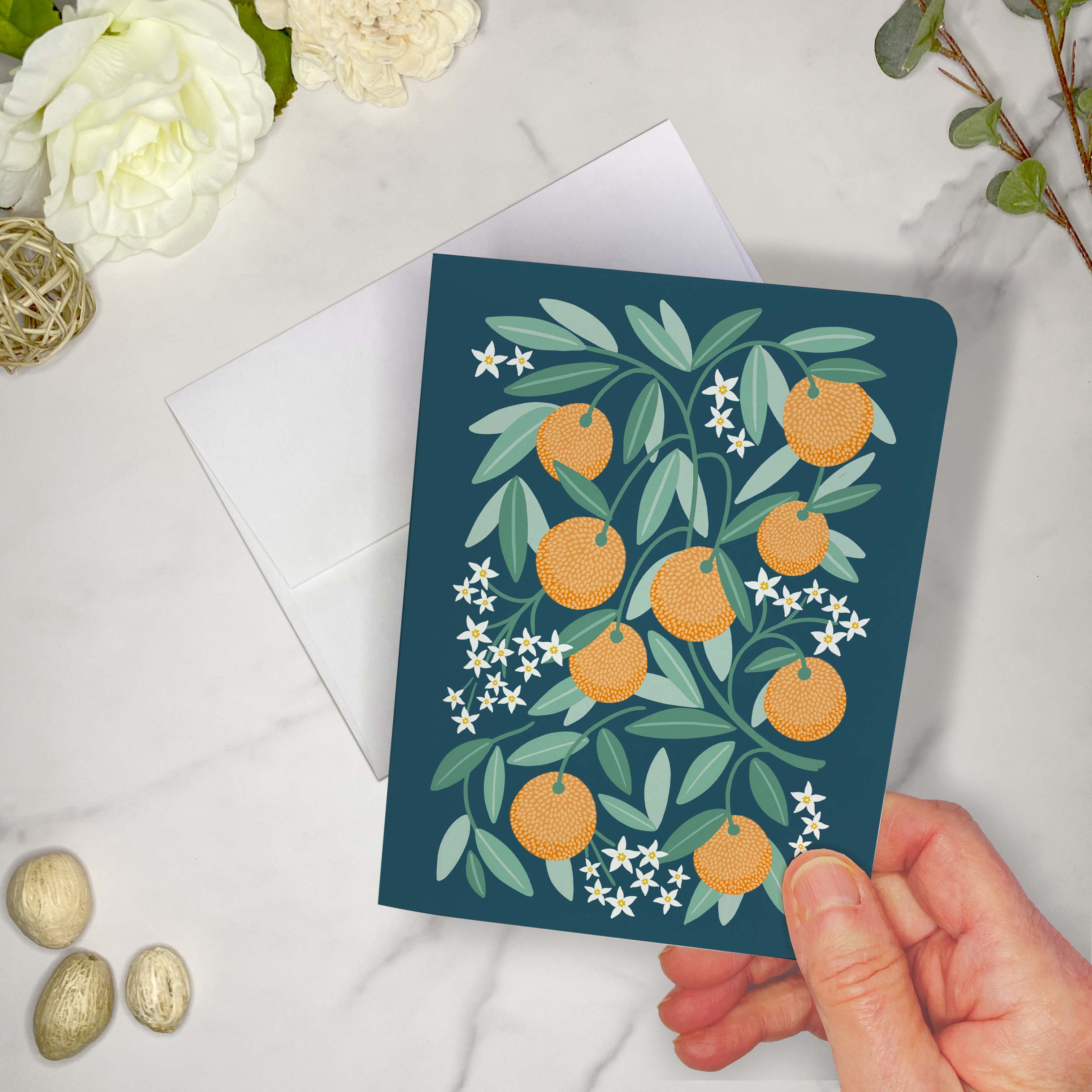 Set of 10 Folded Fruit Note Cards covered in Oranges Design. Each card is 4.25 x 5.5 inches and includes envelopes.