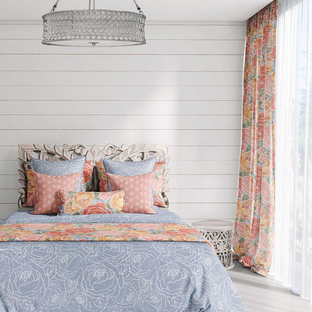 Example of a room with hand painted peonies bursting over a blue watercolor texture curtains. 