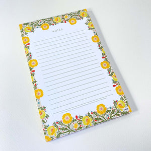 Yellow Poppy Flower Notepads, 5.5 x 8.5 inches, 50 lined pages on easy to write paper.