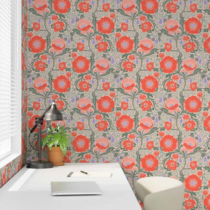 Room with floral wallpaper, desk, and plant