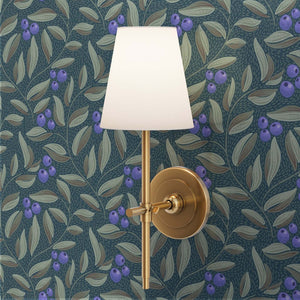Winding blueberries and leaves on a dark teal background detail
