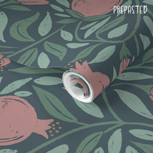 Woodcut Pomegranate fruit and leaves on dark teal background comes in a pre-pasted smooth finish removable wallpaper