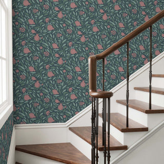 Woodcut Pomegranate fruit and leaves on dark teal background pattern on a stairway