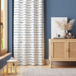 50 inch wide tie dye patterned indigo horizon curtains. Order two to complete a window-scape.